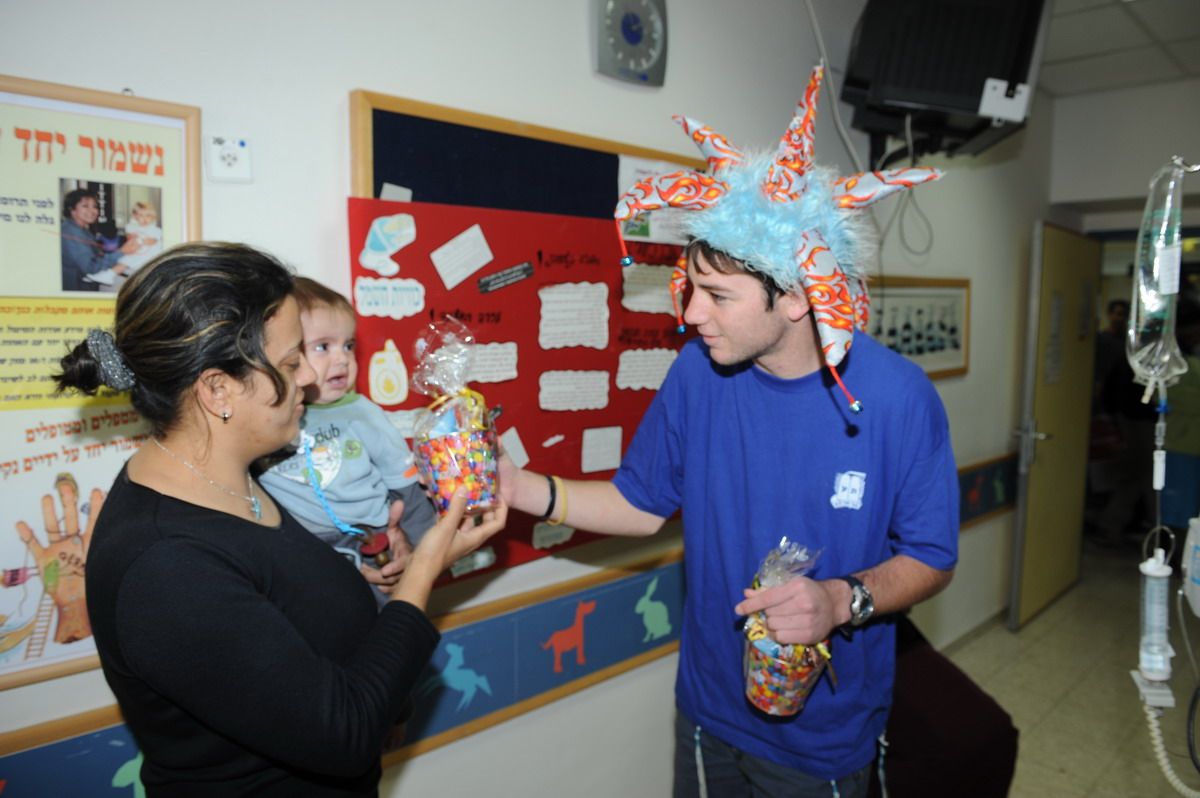 Giving out Purim baskets